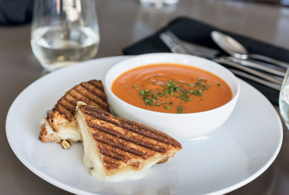 Grilled Gruyere and Taleggio cheese sandwich with tomato bisque