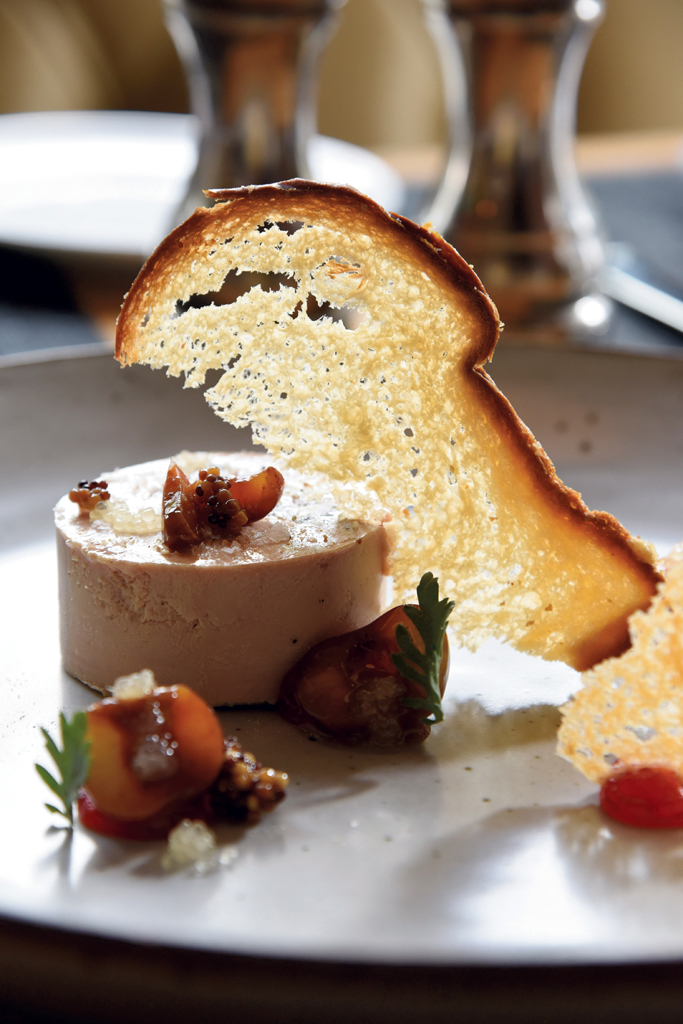 Foie gras torchon with cherry, cocoa nib, finger lime and rhubarb, with toasted brioche