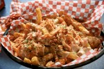 Cheesy fries with snow crab meat and Cajun Seasoning