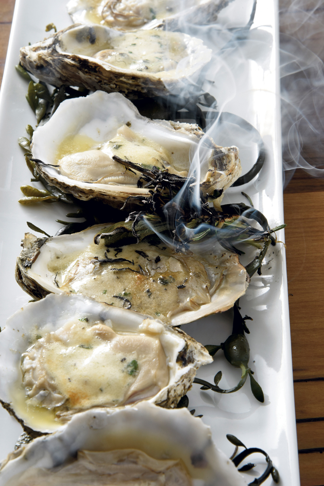 Grilled herb-roasted Chesapeake Bay oysters with garlic butter