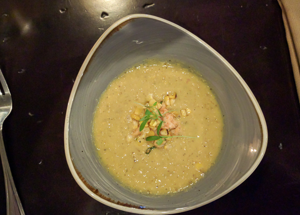 Corn chilled bisque, topped with pickled sweet corn, langoustine lobster and micro cilantro by Chef Kristina Dyer