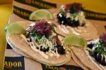 El Taco Luchador’s Pork tacos with pickled onions, tomatillo and crema