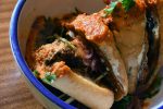 El Taco Luchador’s Carnitas torta with a guajillo dipping sauce