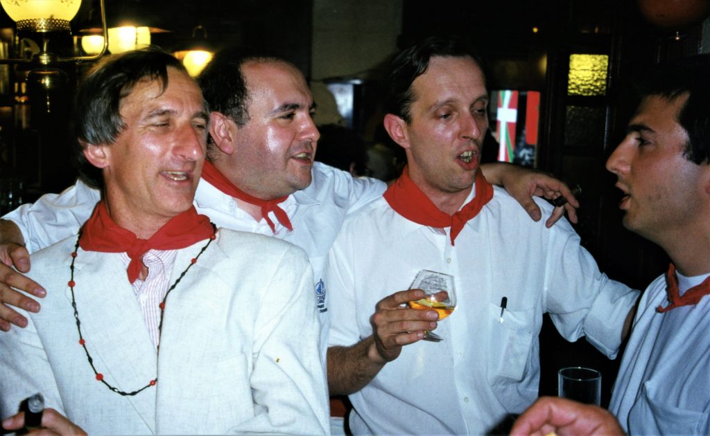 <div>Edibles & Potables: Red scarf, white shirt and San Miguel beer – or, Pamplona’s Festival of San Fermin</div>